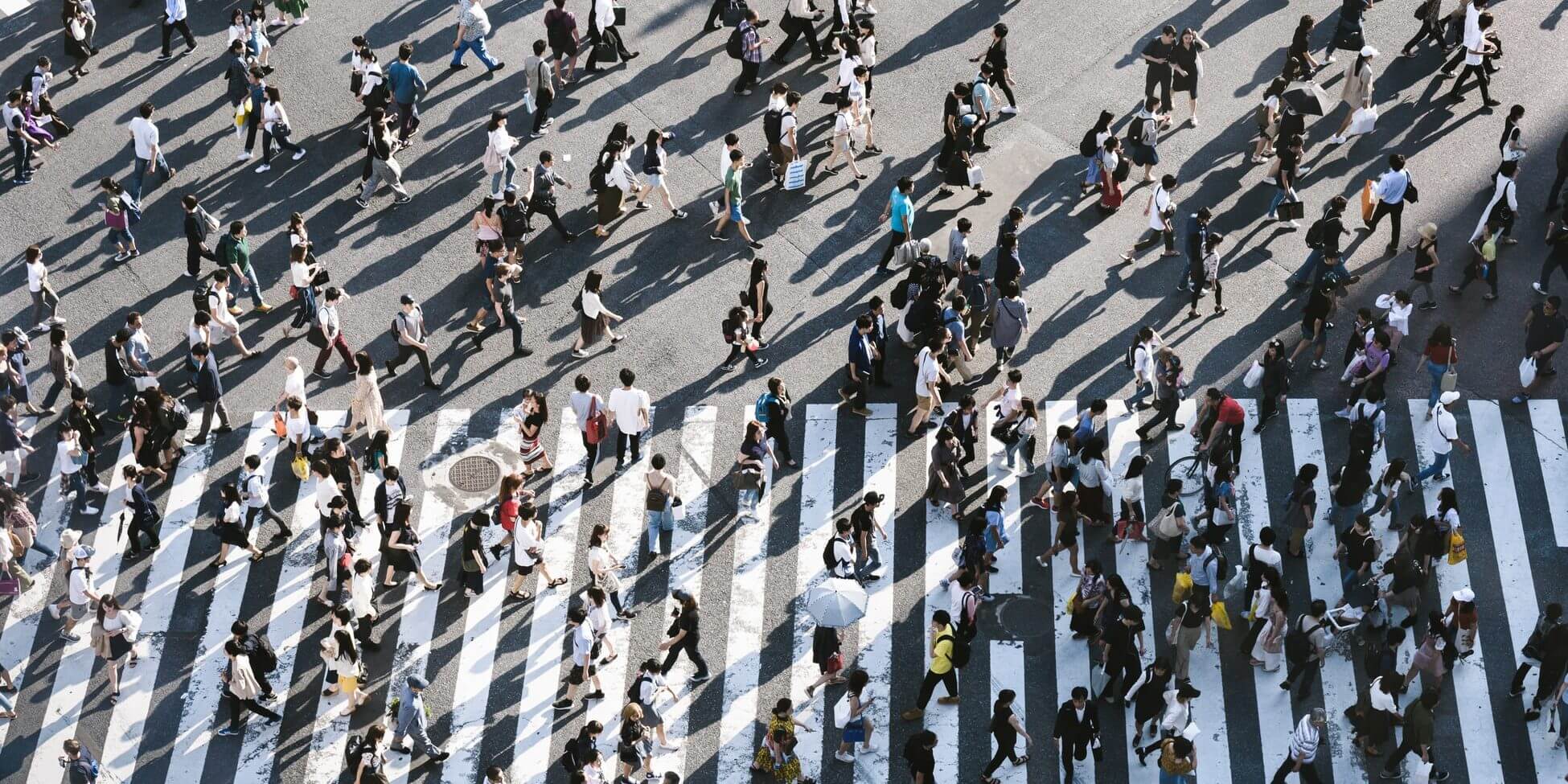 crowd of people at a crossroads